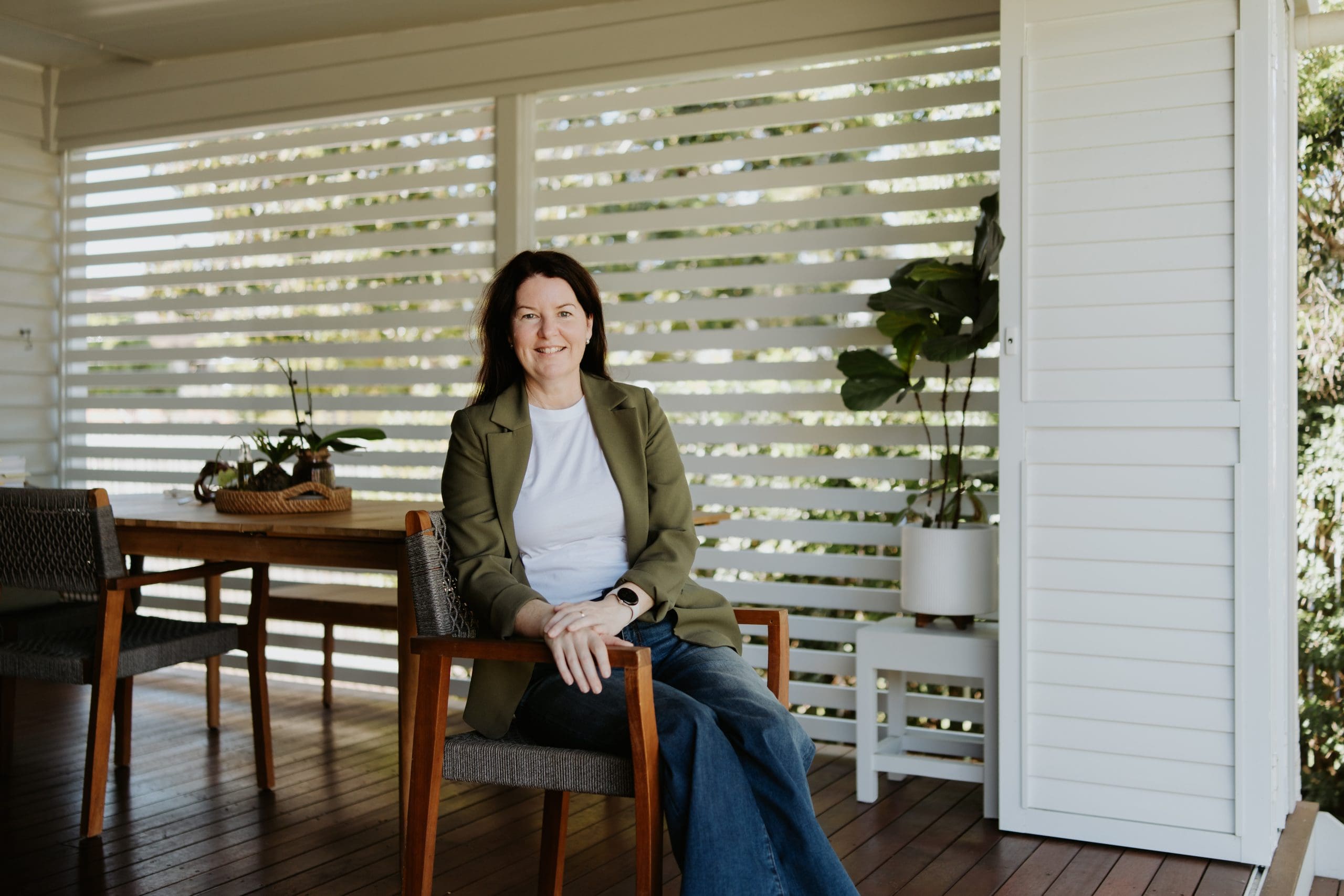 Heidi seated by window